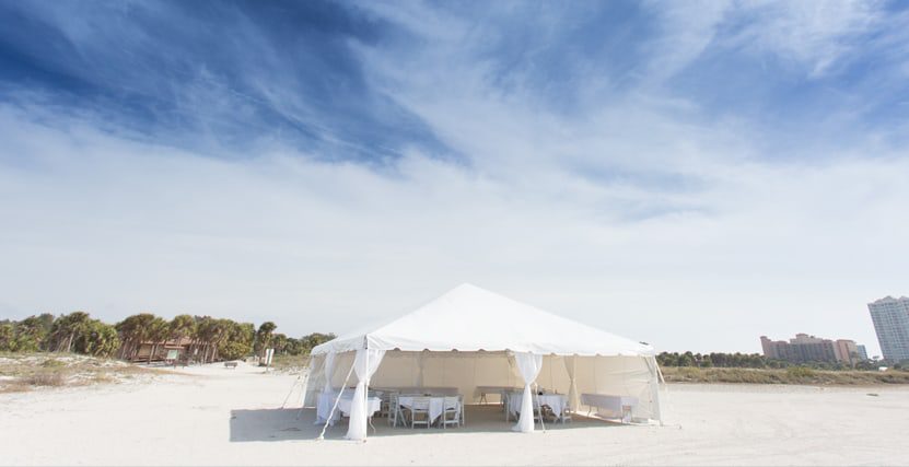 Simple reception tent set up on Sand Key Beach, Clearwater, FL