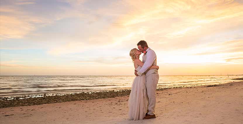 Florida Couple on Beach with Sunset by Taken by Grace and Glory Photography
